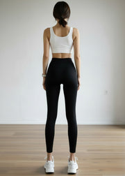 Legging sculptant noir, vue portée de dos