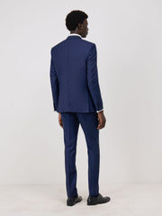 Smoking slim bleu indigo — vue portée en pied, de dos