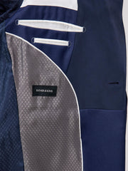 Smoking slim bleu indigo — détail doublure et poche intérieure