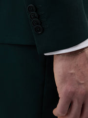 Veste croisée vert bouteille — détail boutons de manche