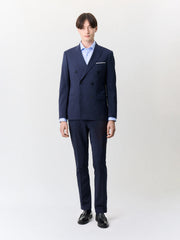 Veste costume croisée bleu marine — vue portée de face, debout
