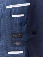 Veste costume croisée bleu marine — détail doublure et poche intérieure
